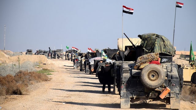 Ina caravana d'autos da l'armada iracaisa