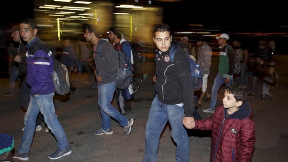 Fugitivs sirians en viadi.
