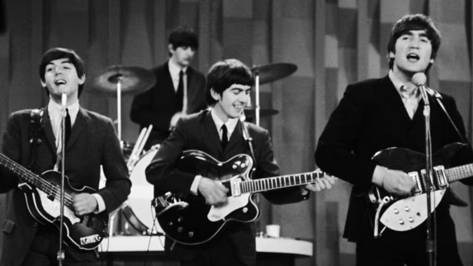 9 da fevrer 1964 - Ils Beatles durant la «Ed Sullivan Show» a New York.