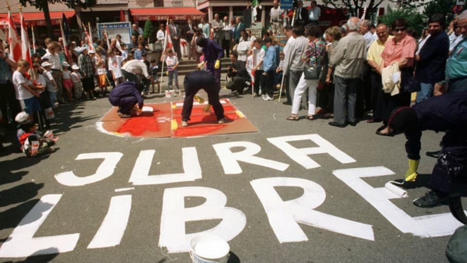 Béliers malegian l’onn 1997 la vopna dal Giura sin ina plazza a Moutier.