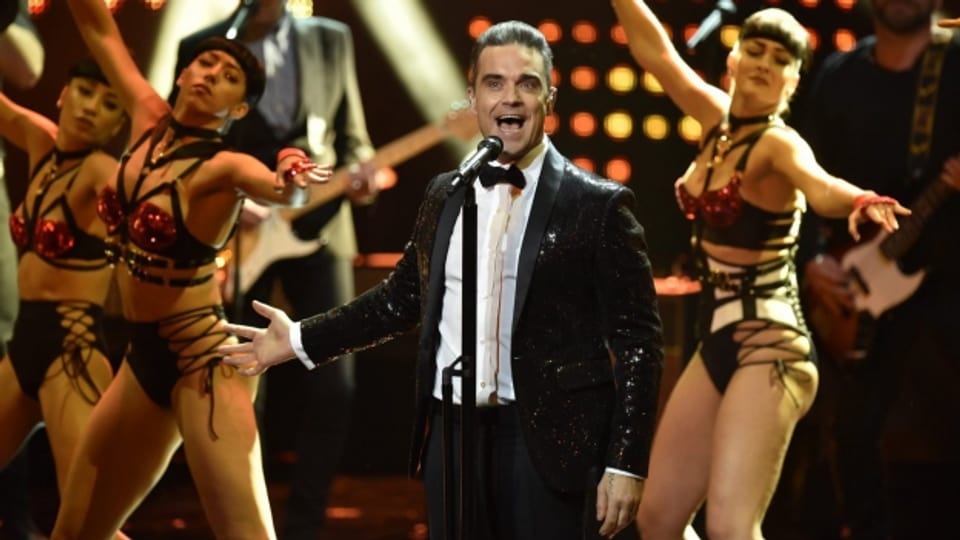 Robbie Williams durant in concert