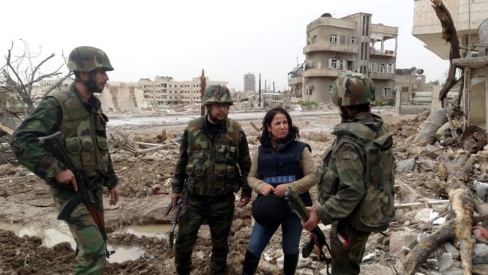 Ina schurnalista en Siria.