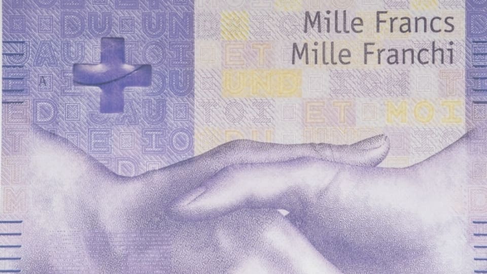 La Banca naziunala svizra ha preschentà la nova bancnota da 1’000: Ella mussa sco motiv principal ina strenschida dal maun. Quai sco simbol per la lingua e la Svizra communicativa.