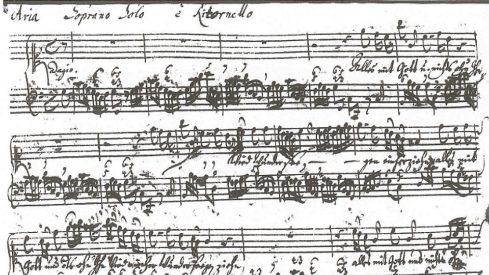 In manuscrit ord la plima da Johann Sebastian Bach.