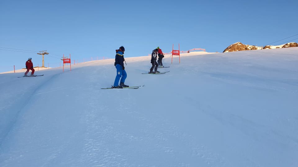 persunas cun skis sin pista da cursa