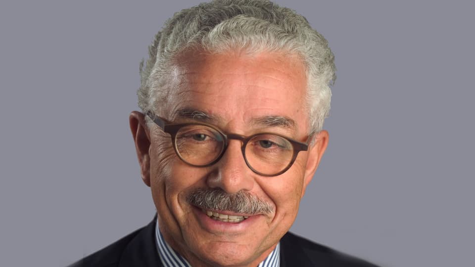 Purtret dad Oscar Knapp.