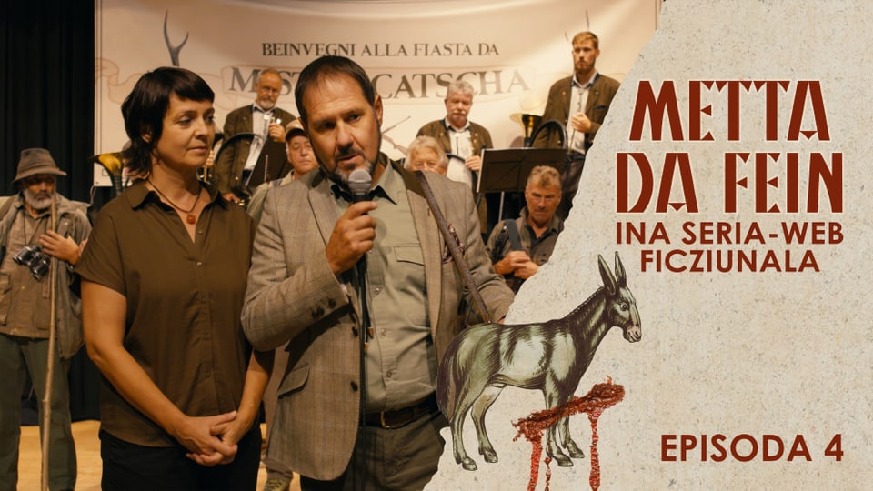 Maletg da simbol per l'episoda 4. President communal è sin tribuna cun ils chatschaders.