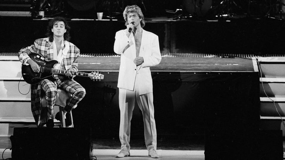 Purtret dal duo Wham sin tribuna