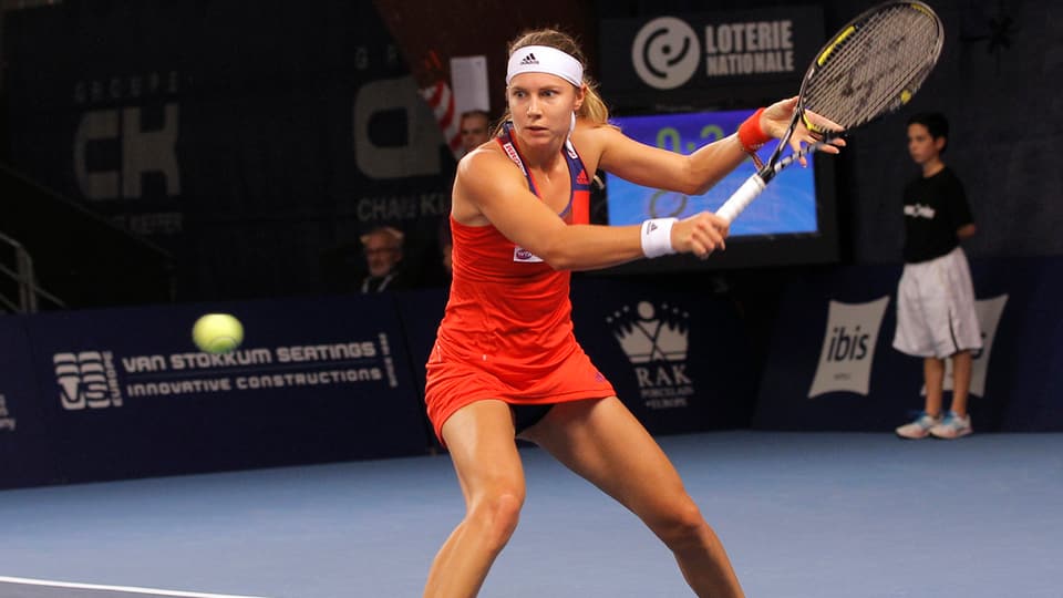 Giugadra da tennis. 