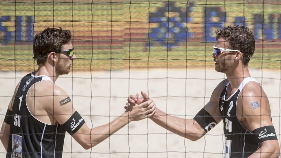 Nico Beeler (sanester) e Marco Krattiger (maletg d'archiv). 