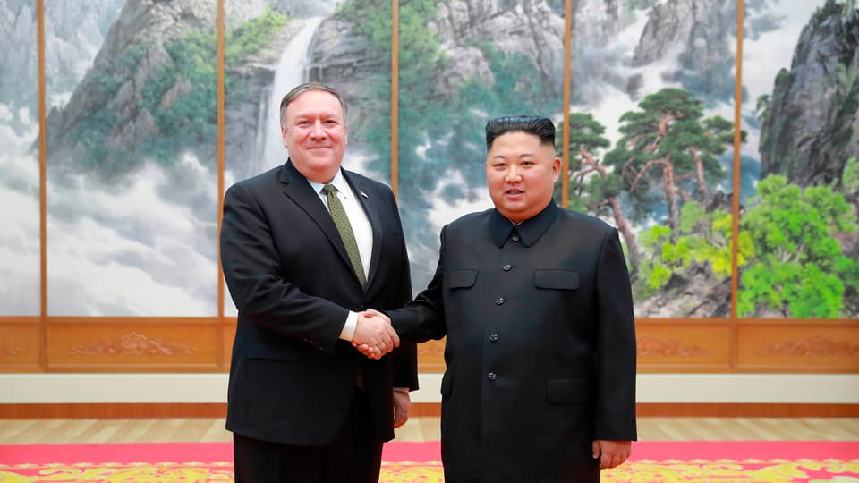 Mike Pompeo e Kim Jong Un. 