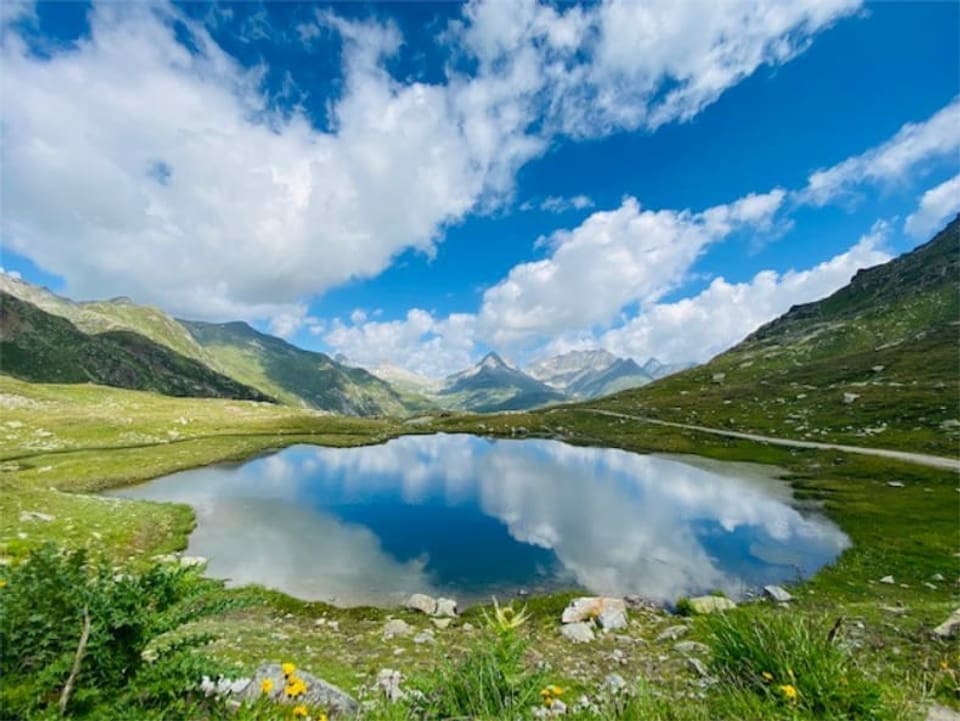 In lai pitschen cun la reflecziun dal tschiel.