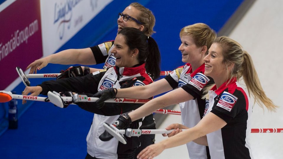 L'equipa da curling da Flem sa legra. 