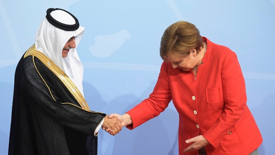 Al Saud e Merkel.