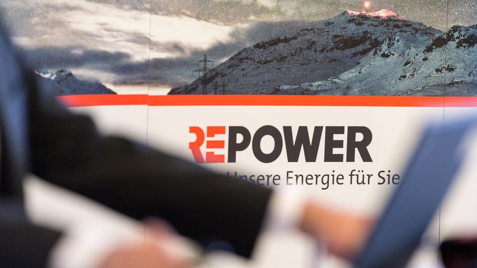 Logo da la Repower cun culms davostiers e davant in computer
