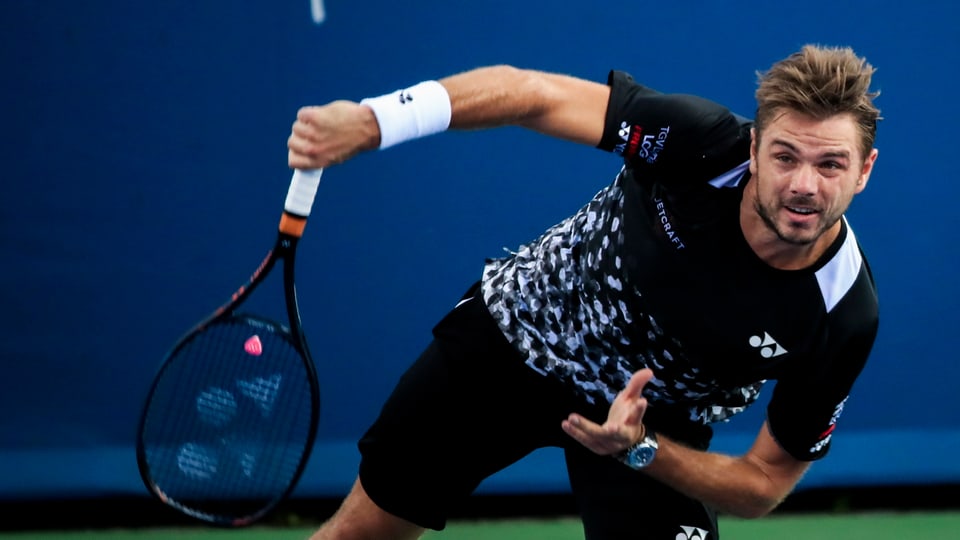 Purtret da Wawrinka co el sajetta ina balla. 