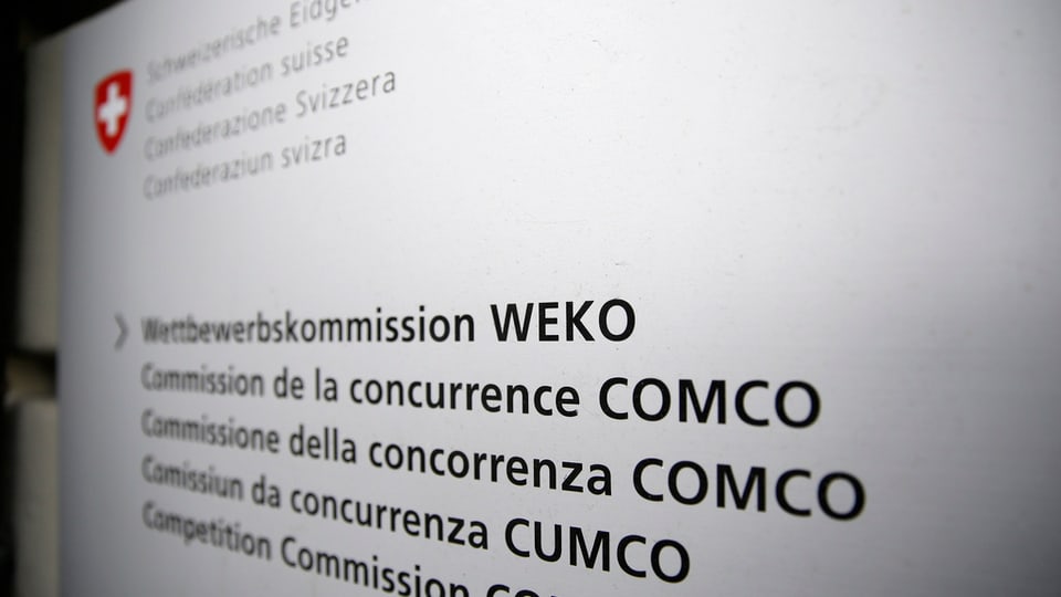 Ina tabla cun scrit si cumissiun da concurrenza CUMCO