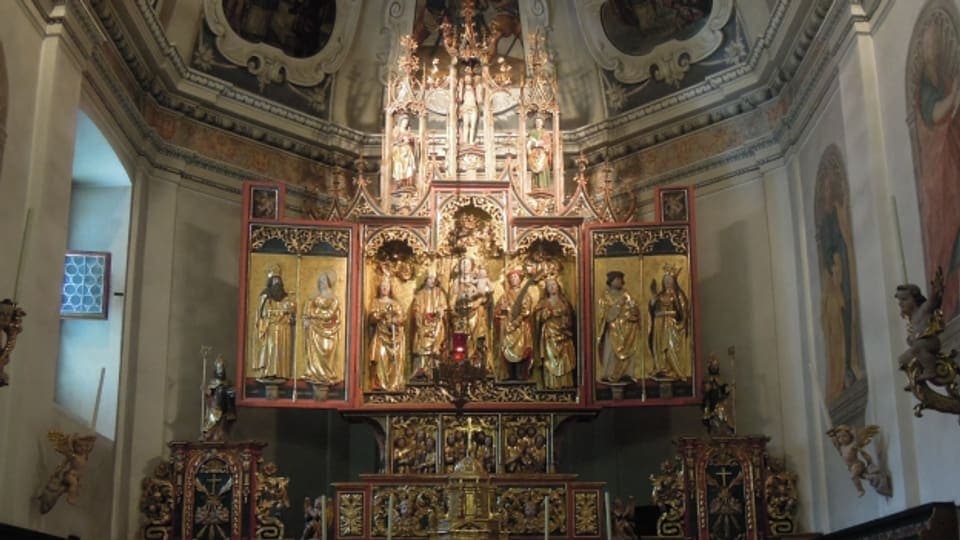 Il tripticon gotic, integrà en l'altar baroc da la baselgia son Plasch a Tinizong.