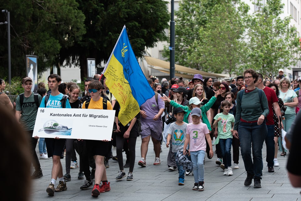 sxolaras e scolars da l'Ucraina