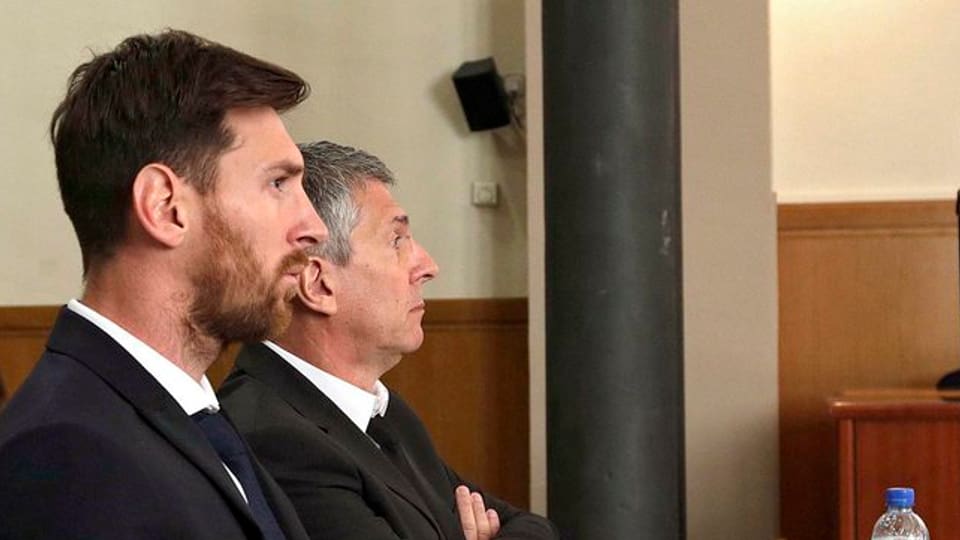 purtret da Lionel Messi e ses bab Jorge
