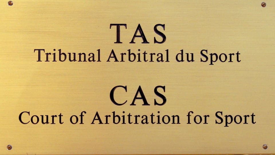TAS.