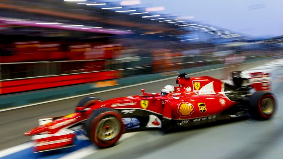 Sebastian Vettel en ses auto da cursa.
