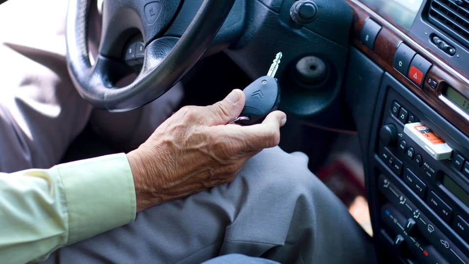 Persuna passada en in auto.