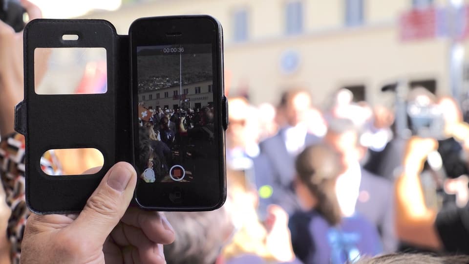 Purtret d'in telefonin vid fotografar Cassis.