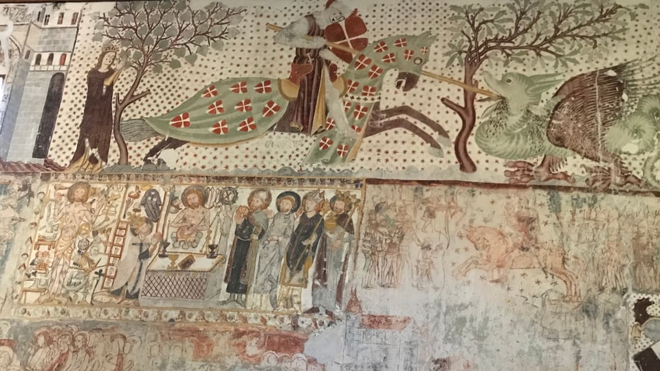 Sogn Gieri cumbatta il dragun. Fresco dal «Meister da Vuorz» en la baselgia Sogn Gieri a Razén.