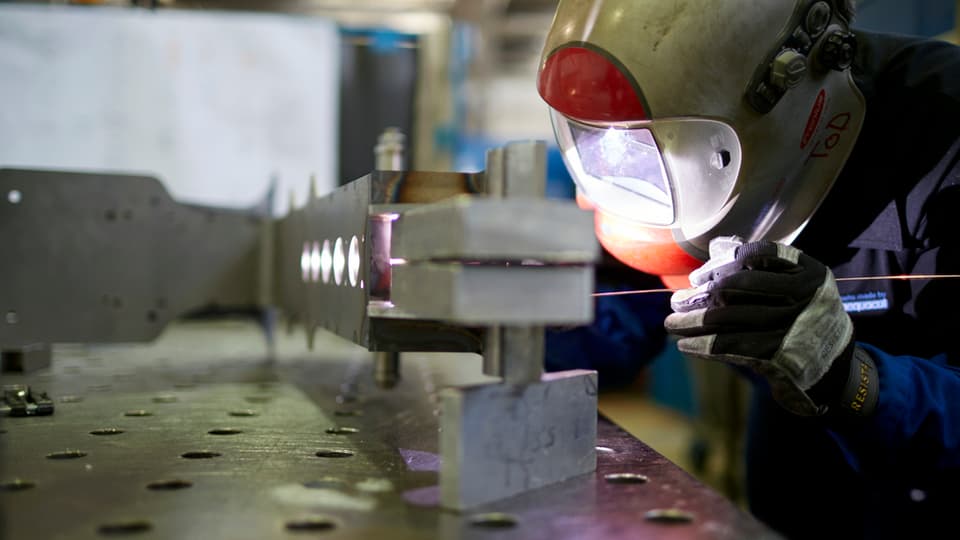Lavurer en in’industria da metal.