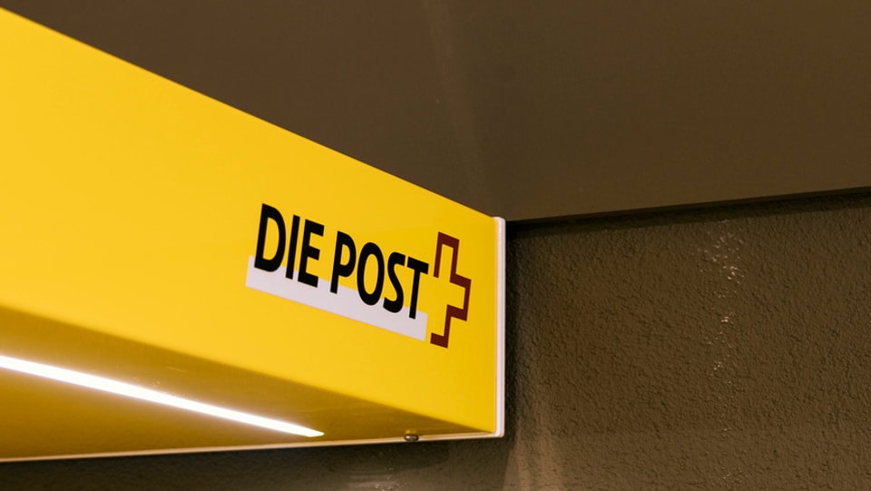 Purtret d'in logo da la posta. 