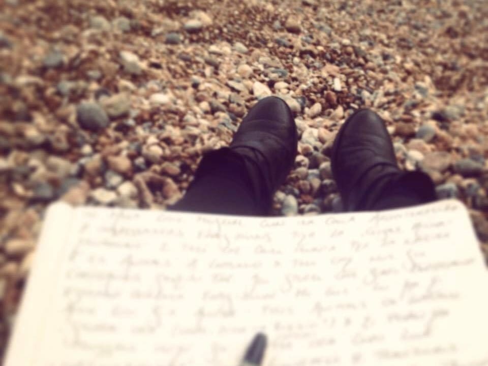 Fotografia scriver a la riva da la mar