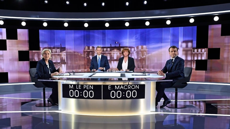 Marine Le Pen ed Emmanuel Macron curt avant la debatta.
