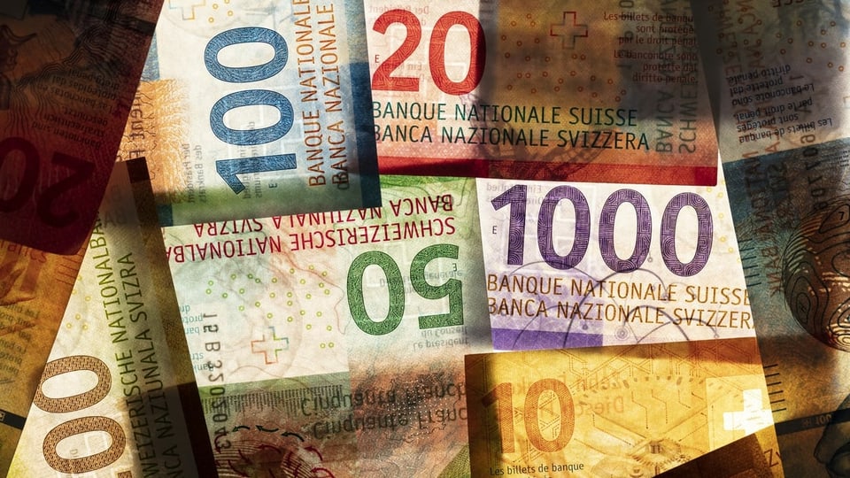 Il maletg mussa bleras bancnotas.