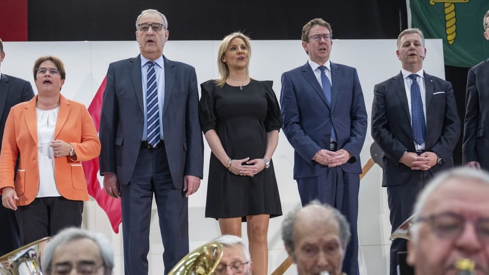 Manadras e manaders da la PPS a Meyrin GE. A la sanestra Marco Chiesa.