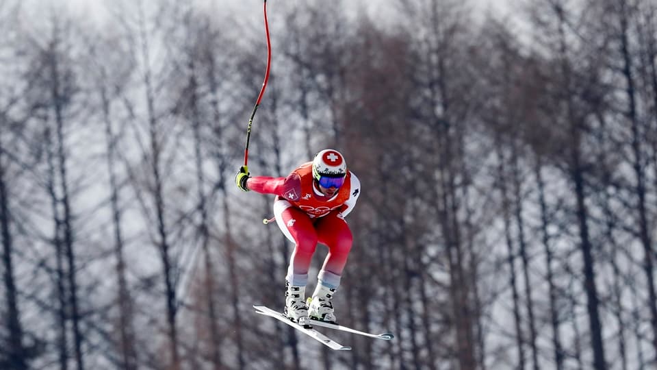 Purtret da Beat Feuz durant il trenament da la cursa rapida. 