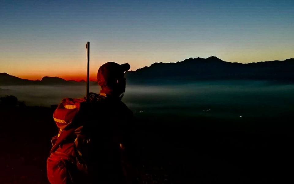 Jäger im Sonnenaufgang