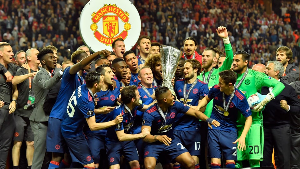 Ils giugaders da Manchester United cun il buccal.