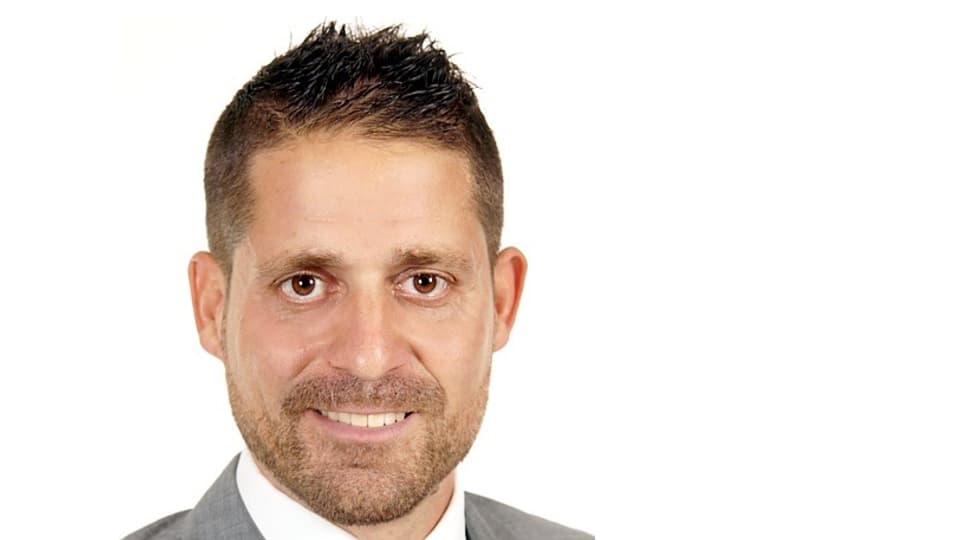 Purtret da Claude Meier.
