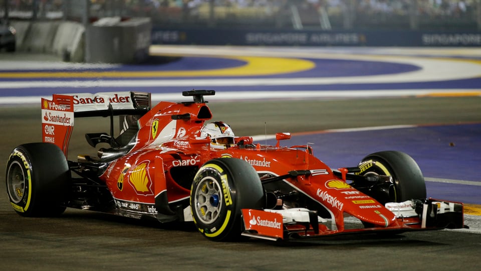 Sebastian Vettel en ses Ferrari.