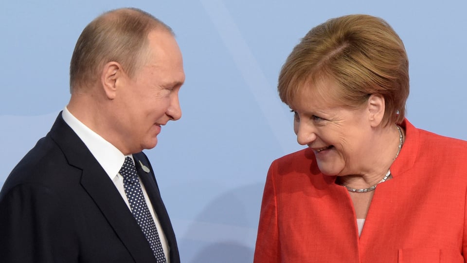 Putin e Merkel.
