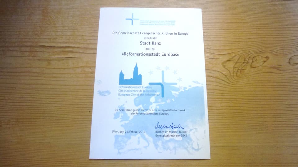 Il document uffizial da la CBEE, che attesta a la citad da Glion il label sco “Citad europeica da la refurmaziun”.