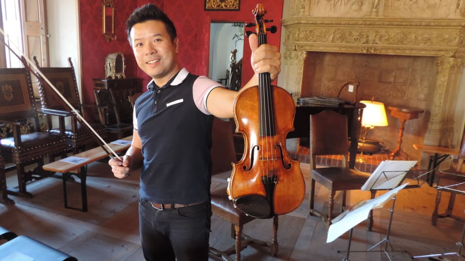 Xiaoming Wang cun la violina Stradivari cun il num Aurea dal 1715
