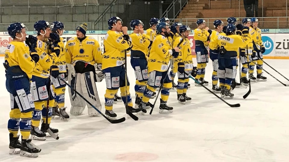 In'equipa da hockey plitost pensiva.