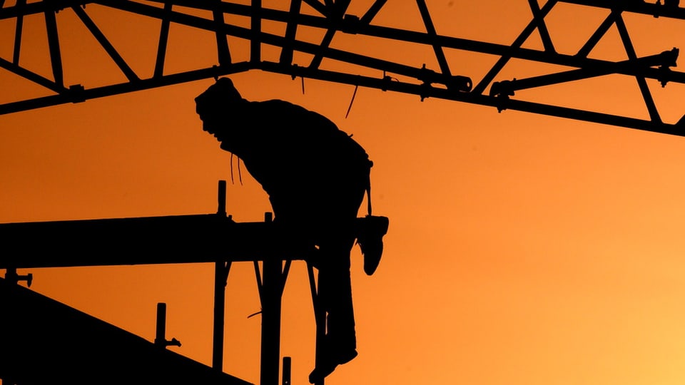 In lavurer da construcziun.
