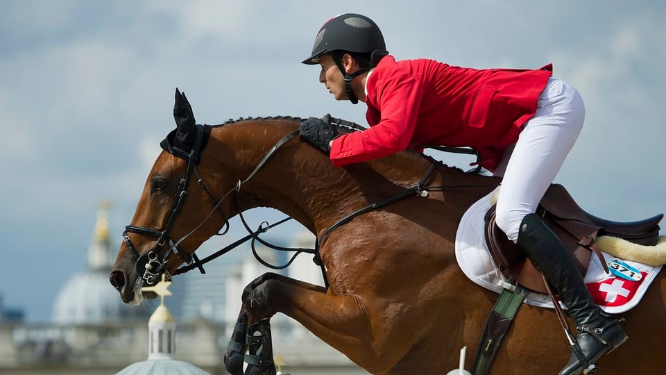 Steve Guerdat e ses chaval Nino Des Buissonnets als gieus olimpics 2012 a Londra.