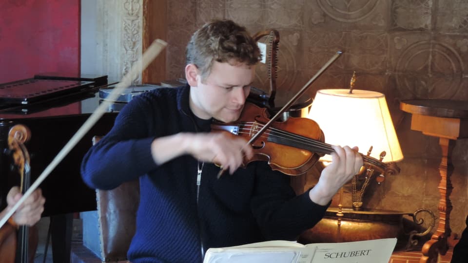 Sebastian Bohren cun la violina Stradivai cun il num King George dal 1710