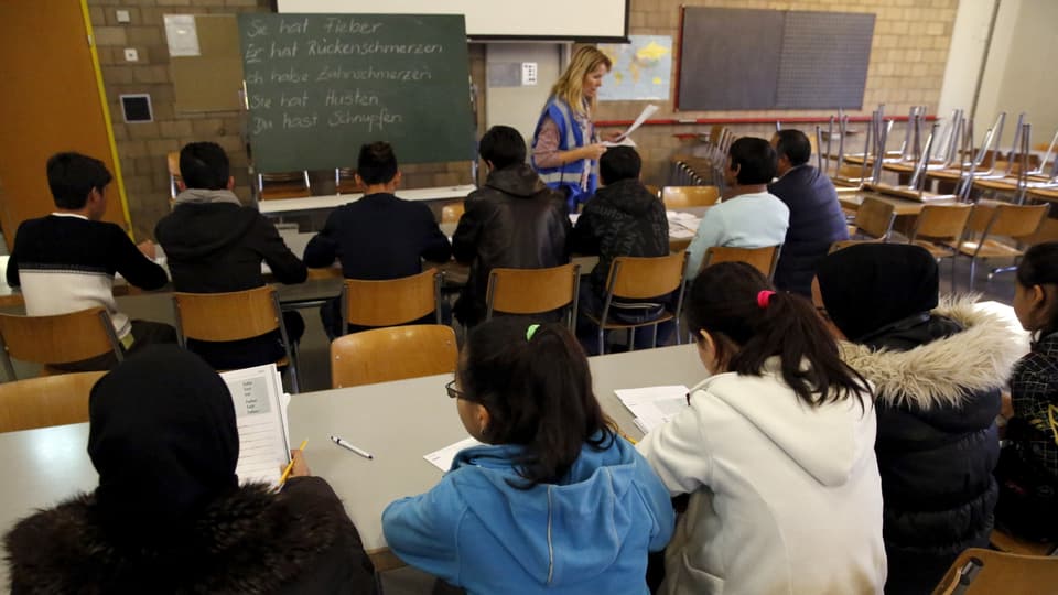 Requirents d'asil vid emprender tudestg.